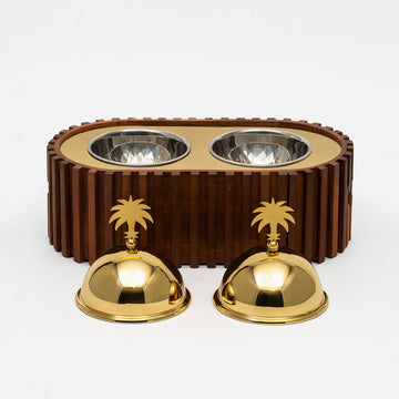 Dog bowl set with gold accents on a white background
