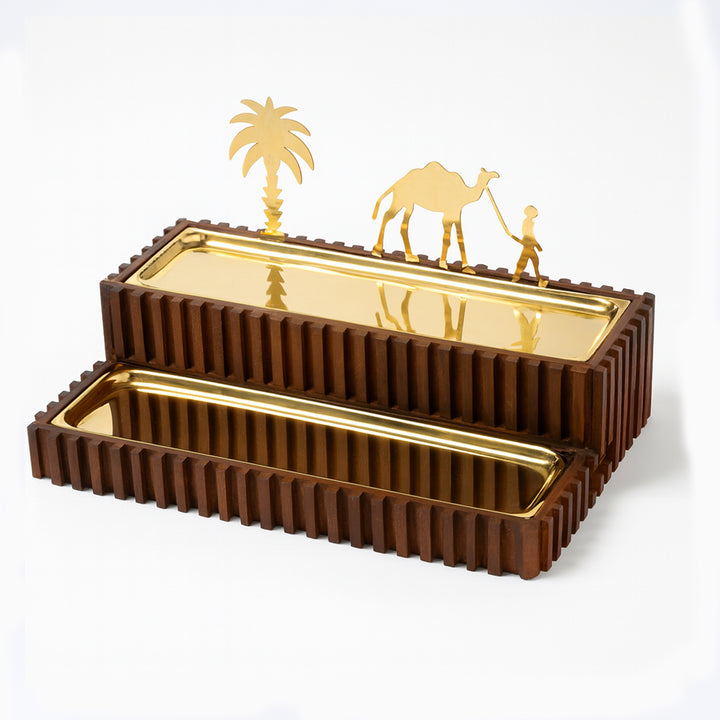 Decorative tray with camel and palm tree designs on a white background