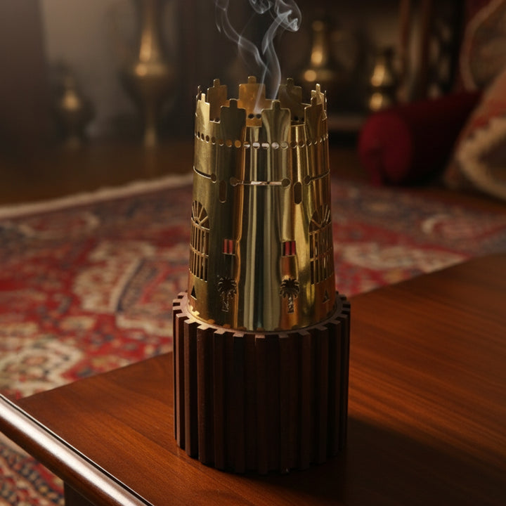 Decorative smoking device on a wooden table with a blurred background