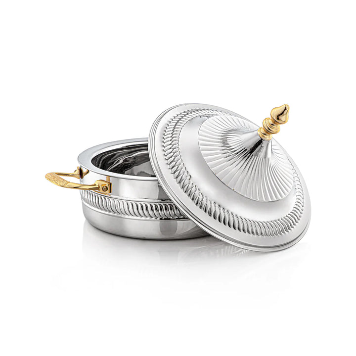 Silver container with a lid and gold accents on a white background