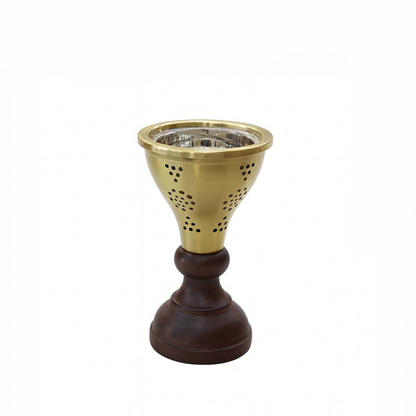 Decorative candle holder with brass top and wooden base on a white background