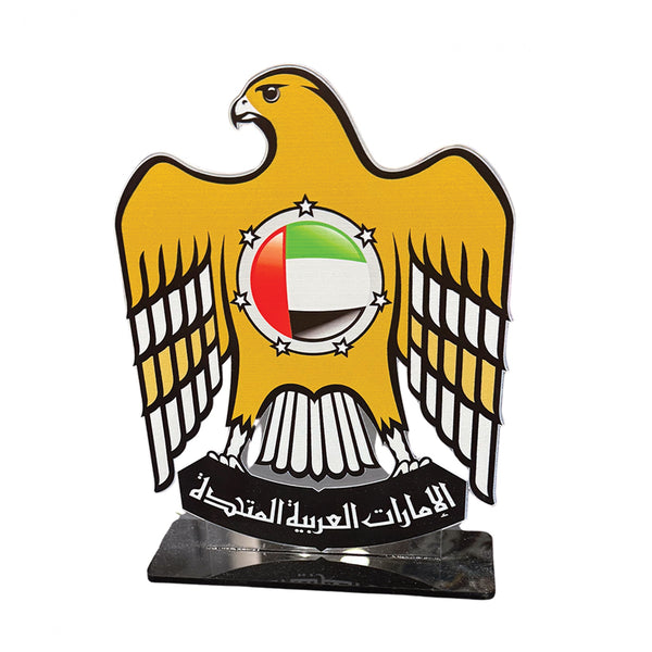 Decorative eagle emblem with a flag design on a white background