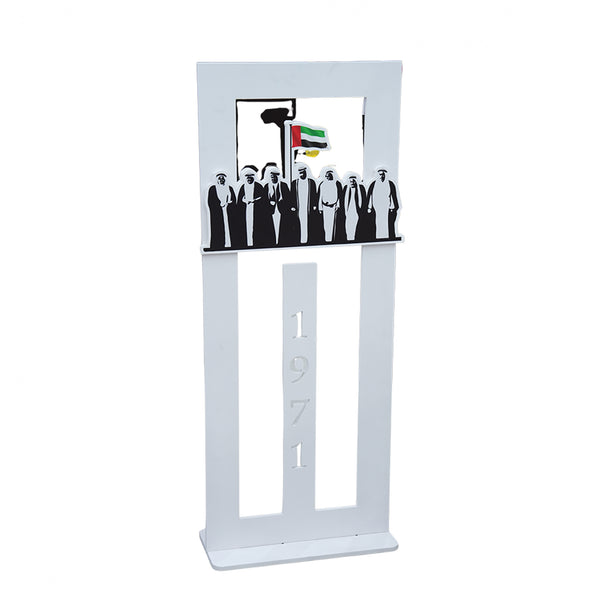 Decorative stand with silhouettes of people and a flag design on a white background