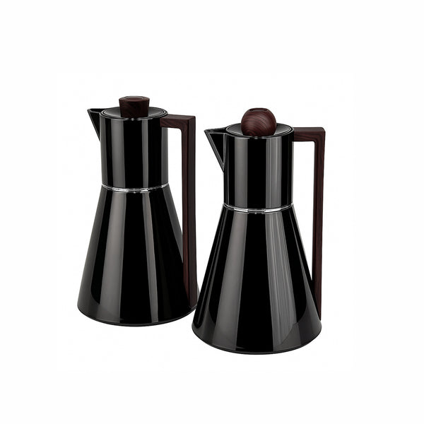 Two black coffee pots with brown knobs on a white background