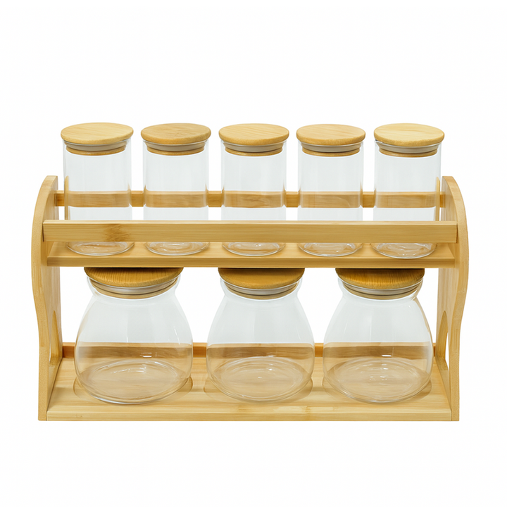 Bamboo spice rack with glass jars and wooden lids on a white background