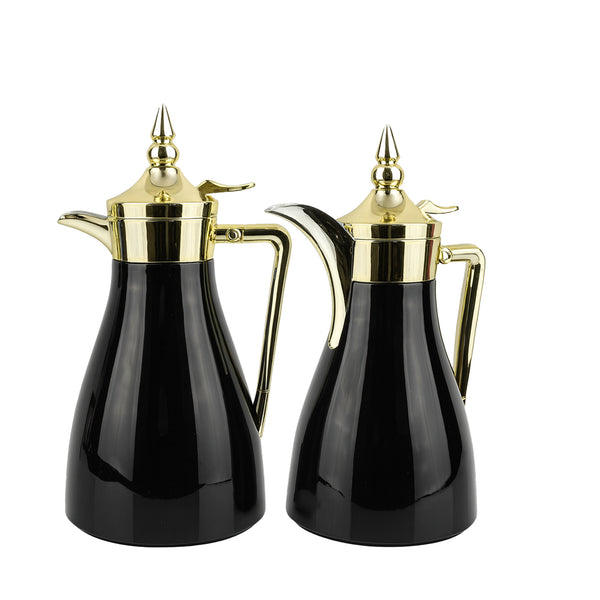 Two black coffee pots with gold lids and handles on a white background