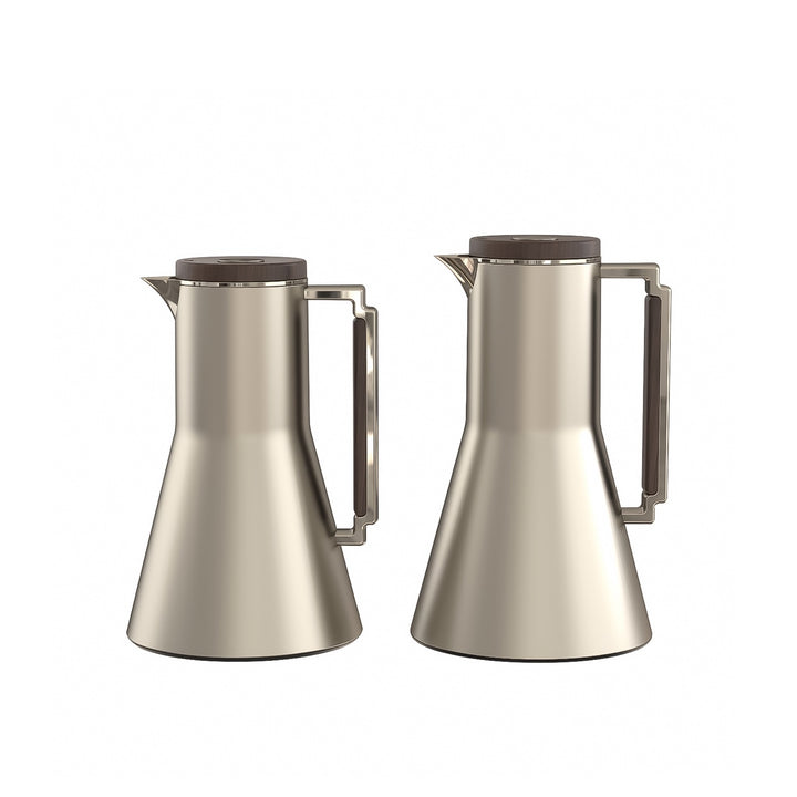 Two silver coffee pots with black lids on a white background