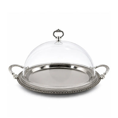 Elegant round cake plate with a clear acrylic dome lid, metal handles, and silver and black finish, perfect for stylish cake and dessert presentation at Siddiq Gifts.