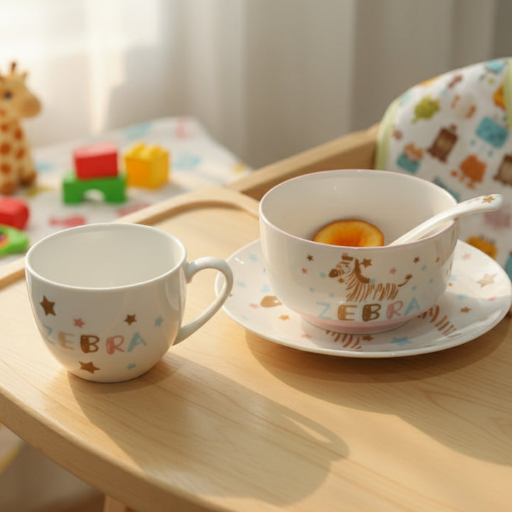 Two children's mugs with 'zebra' design on a wooden table with toys in the background.
