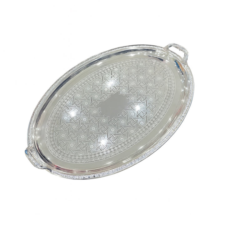 Decorative glass tray with intricate patterns on a white background