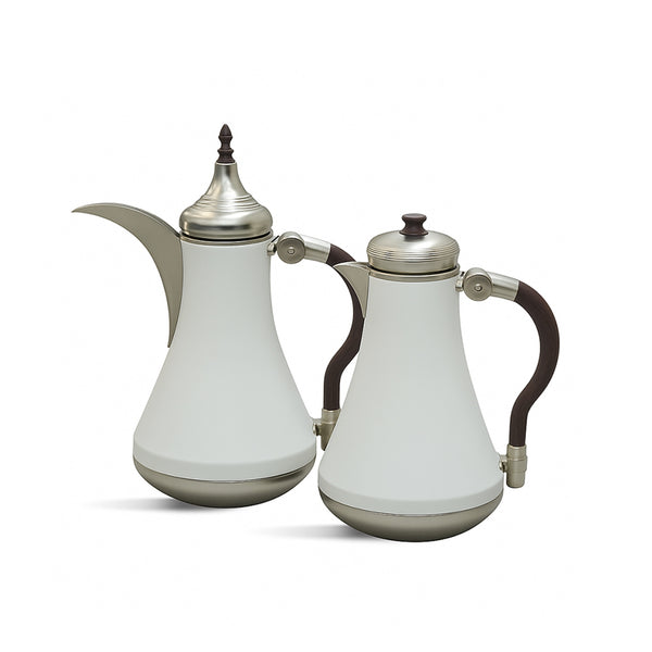 Two white ceramic teapots with silver lids and brown handles on a white background