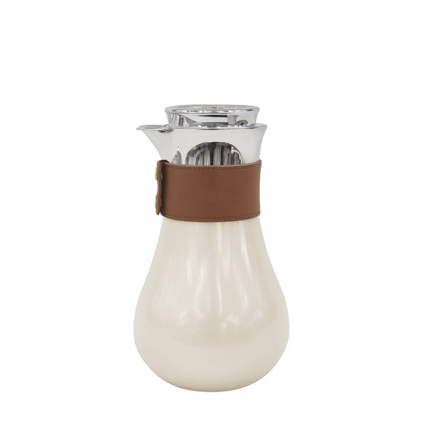 White carafe with brown leather strap on a white background