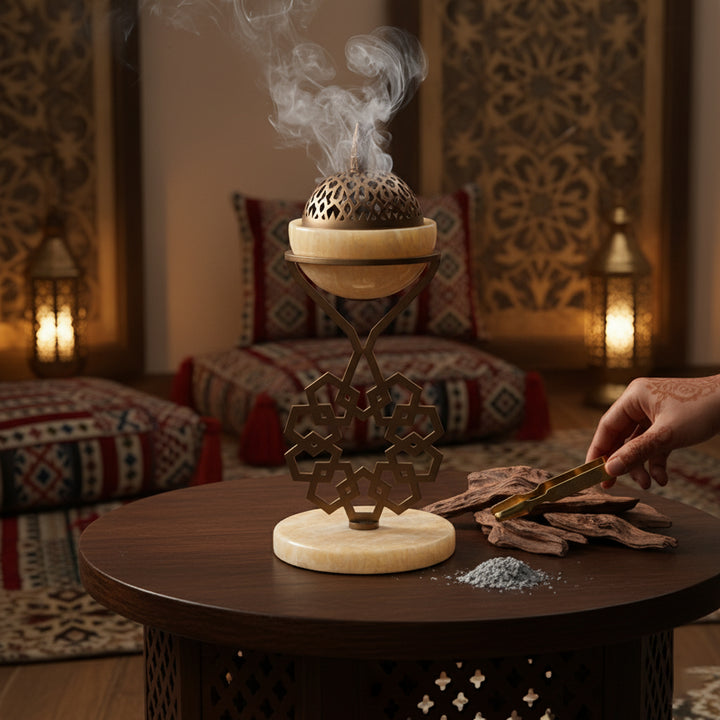 Incense burner with smoke in a decorative room with lanterns and cushions.
