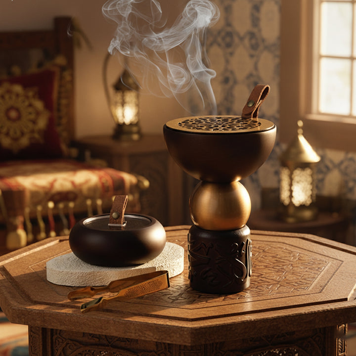 Decorative incense burner with smoke on a wooden table in a warm, indoor setting.