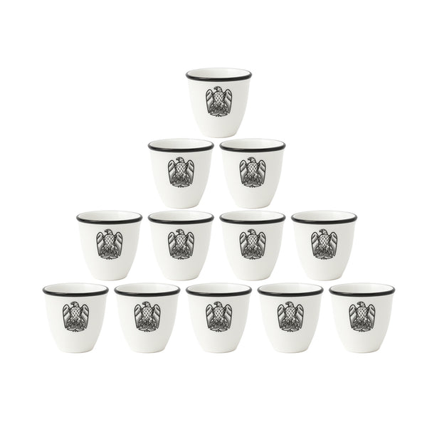 Set of twelve white cups with black rim and emblem on a white background